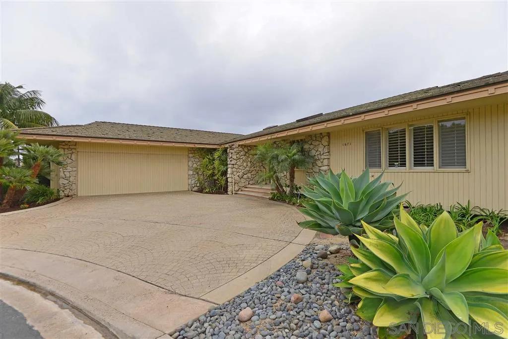 1671 Paseo Bonita La Jolla, CA 92037 - Photo 2 of 17 a house with a plant in front of it