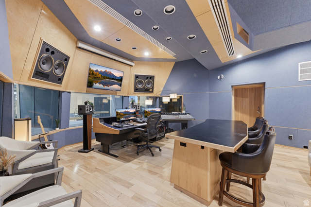 702 Alpine Highway Alpine, UT 84004 - Photo 67 of 83 Professional sound recording studio featuring acoustic wall and ceiling paneling, recessed lighting, wood-finish flooring, and a built-in workstation