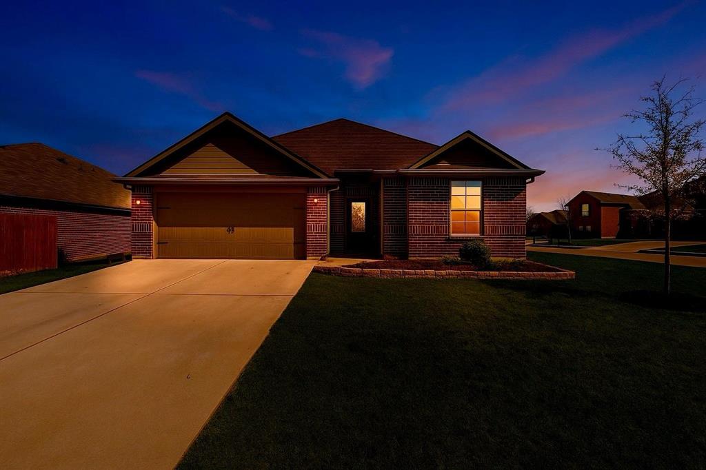 1837 Rialto Lane Crowley, TX 76036 - Photo 1 of 19 Brick and siding exterior with a pitched roofline