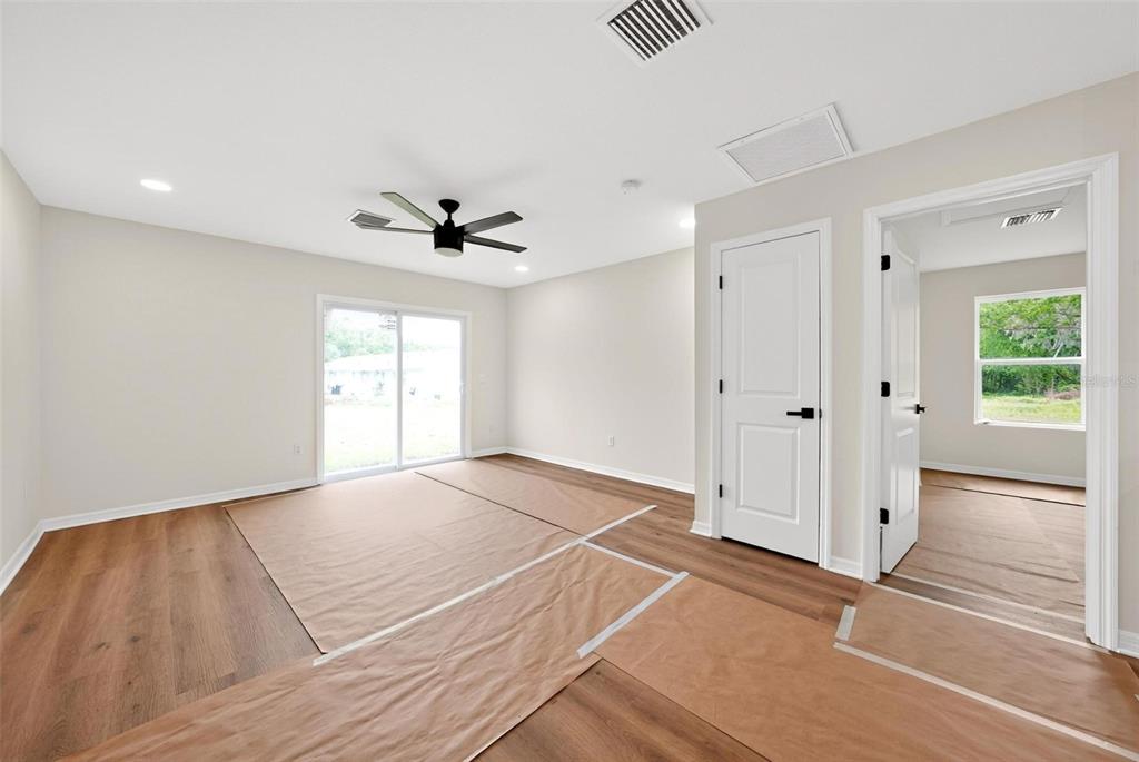607 Thomas Avenue Leesburg, FL 34748 - Photo 15 of 50 a view of an empty room with a window