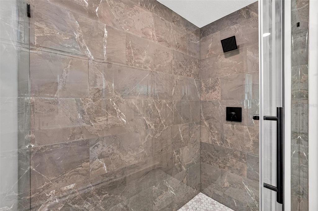 607 Thomas Avenue Leesburg, FL 34748 - Photo 30 of 50 a bathroom with a shower