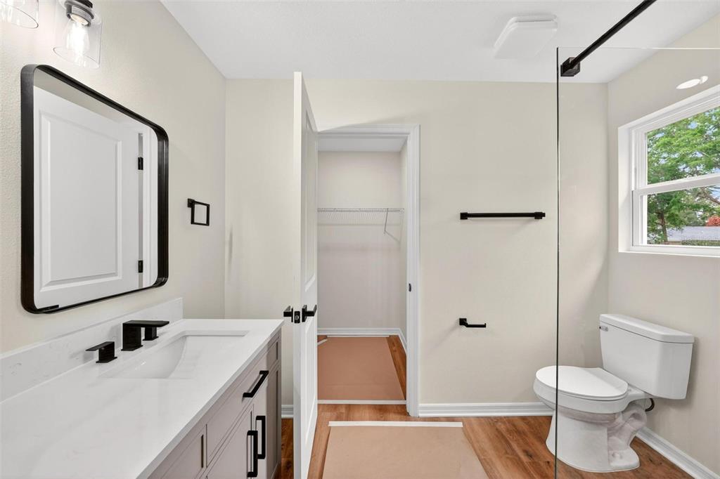 607 Thomas Avenue Leesburg, FL 34748 - Photo 31 of 50 a bathroom with a sink toilet and shower