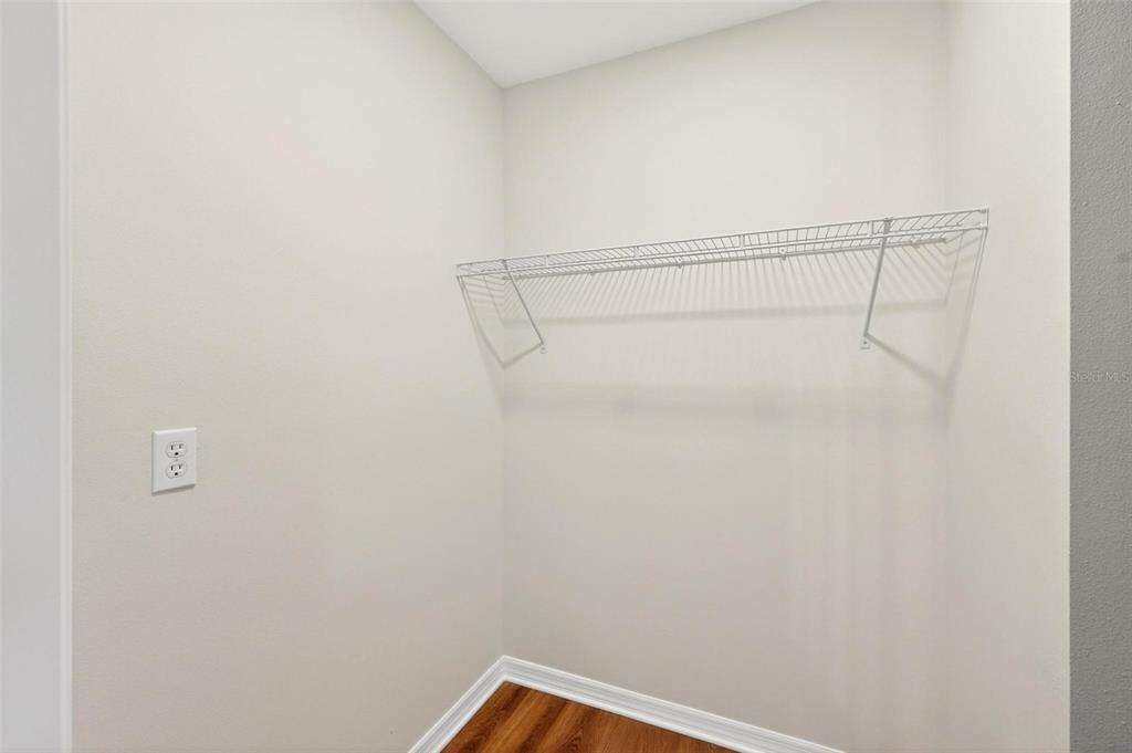607 Thomas Avenue Leesburg, FL 34748 - Photo 32 of 50 a view of small space with racks on the wall