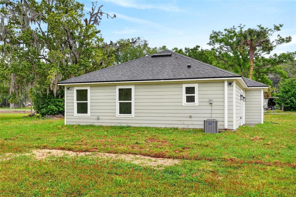 607 Thomas Avenue Leesburg, FL 34748 - Photo 44 of 50 a house view with a garden space
