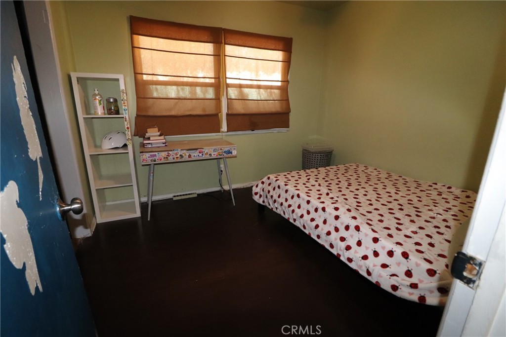 4040 Lehman Road La Crescenta, CA 91214 - Photo 6 of 10 a bedroom with a bed and a window