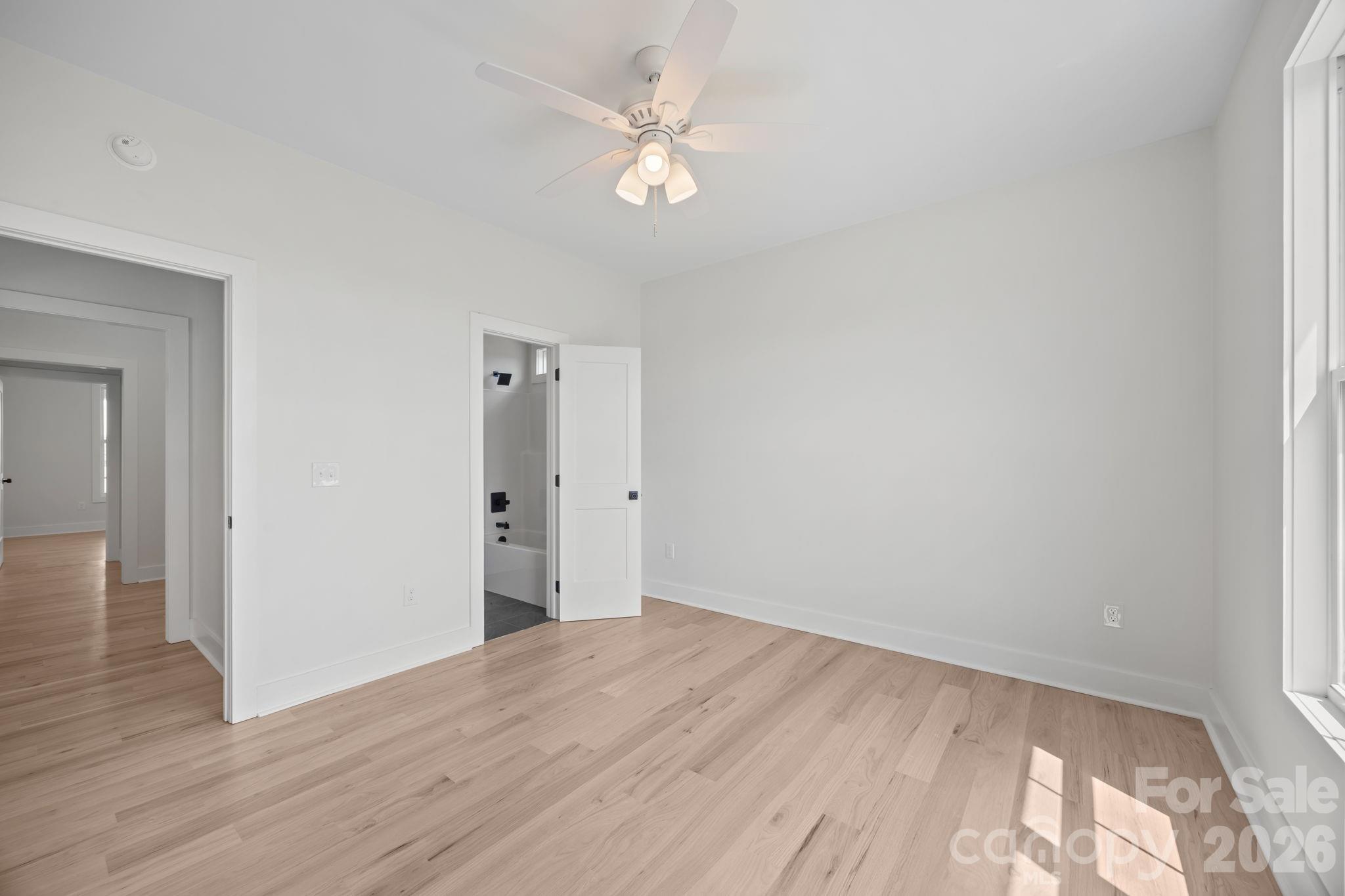4805 Patterson Road China Grove, NC 28023 - Photo 33 of 42 a view of a room with wooden floor and a ceiling fan