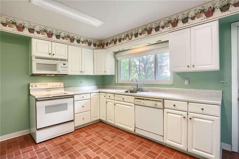 9558 Meadow Road Allison Park, PA 15101 - Photo 10 of 22 Large window above kitchen looking out to flat yard