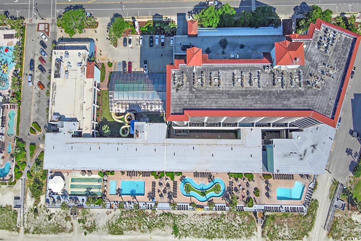 2311 South Ocean Boulevard, Unit 624 Myrtle Beach, SC 29577 - Photo 25 of 28 Aerial view of a pool area with multiple outdoor pools, lazy river, water features.