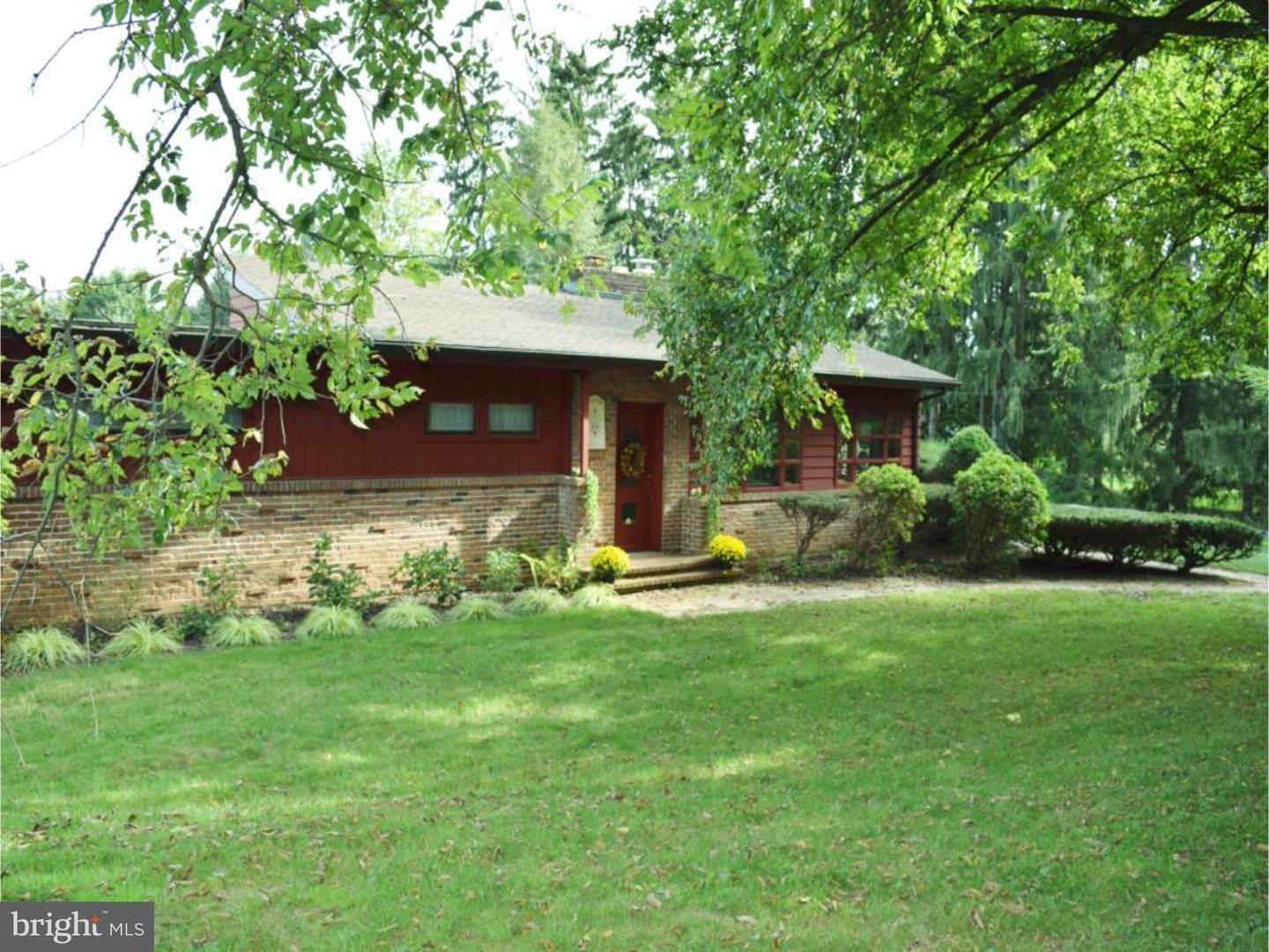 1707 Golf Road Reading, PA 19601 - Photo 1 of 17 a view of a house with backyard and sitting area