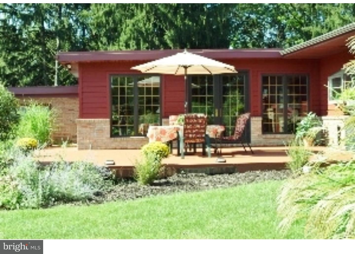 1707 Golf Road Reading, PA 19601 - Photo 2 of 17 a view of a house with a yard and sitting area