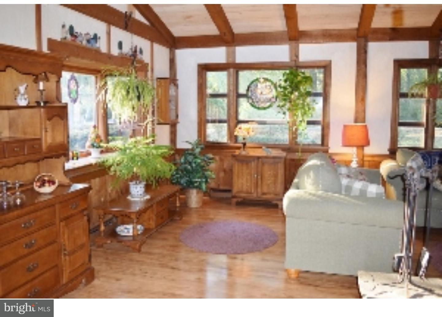 1707 Golf Road Reading, PA 19601 - Photo 12 of 17 a living room with furniture and a large window