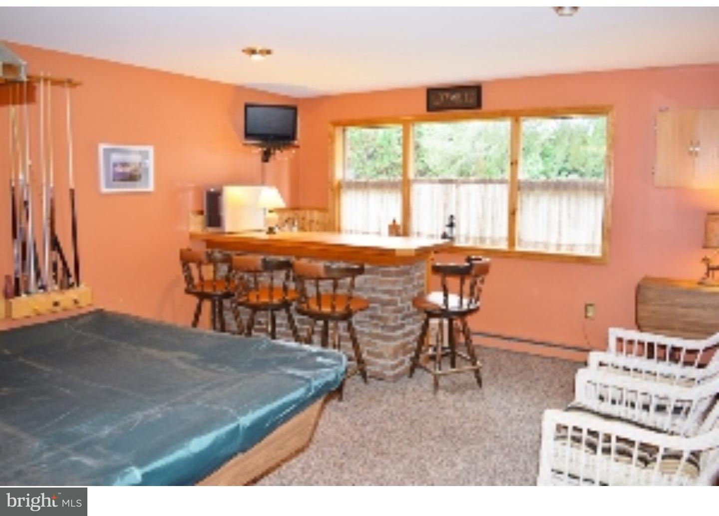1707 Golf Road Reading, PA 19601 - Photo 16 of 17 a dining room with a table and chairs