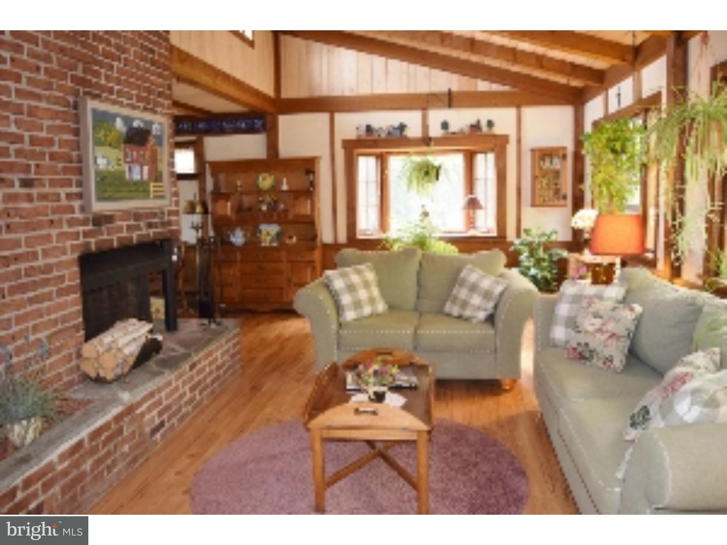 1707 Golf Road Reading, PA 19601 - Photo 10 of 17 a living room with furniture and a fireplace