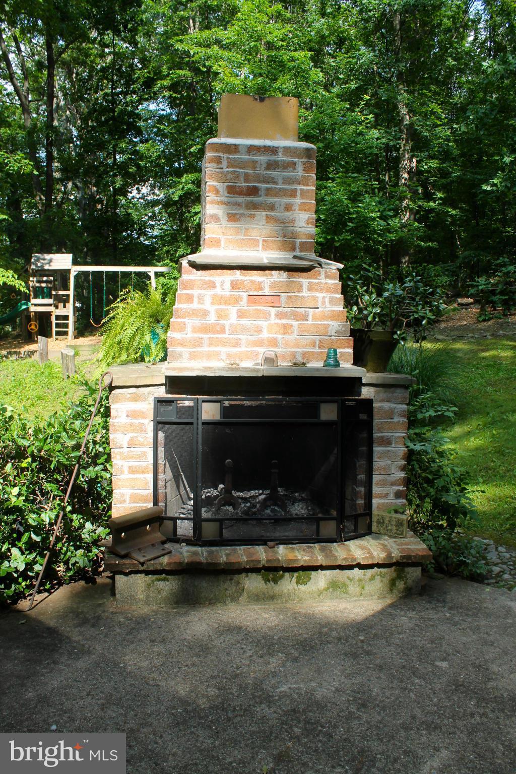 8331 Mapleville Road Mount Airy, MD 21771 - Photo 22 of 26 Outdoor Fireplace