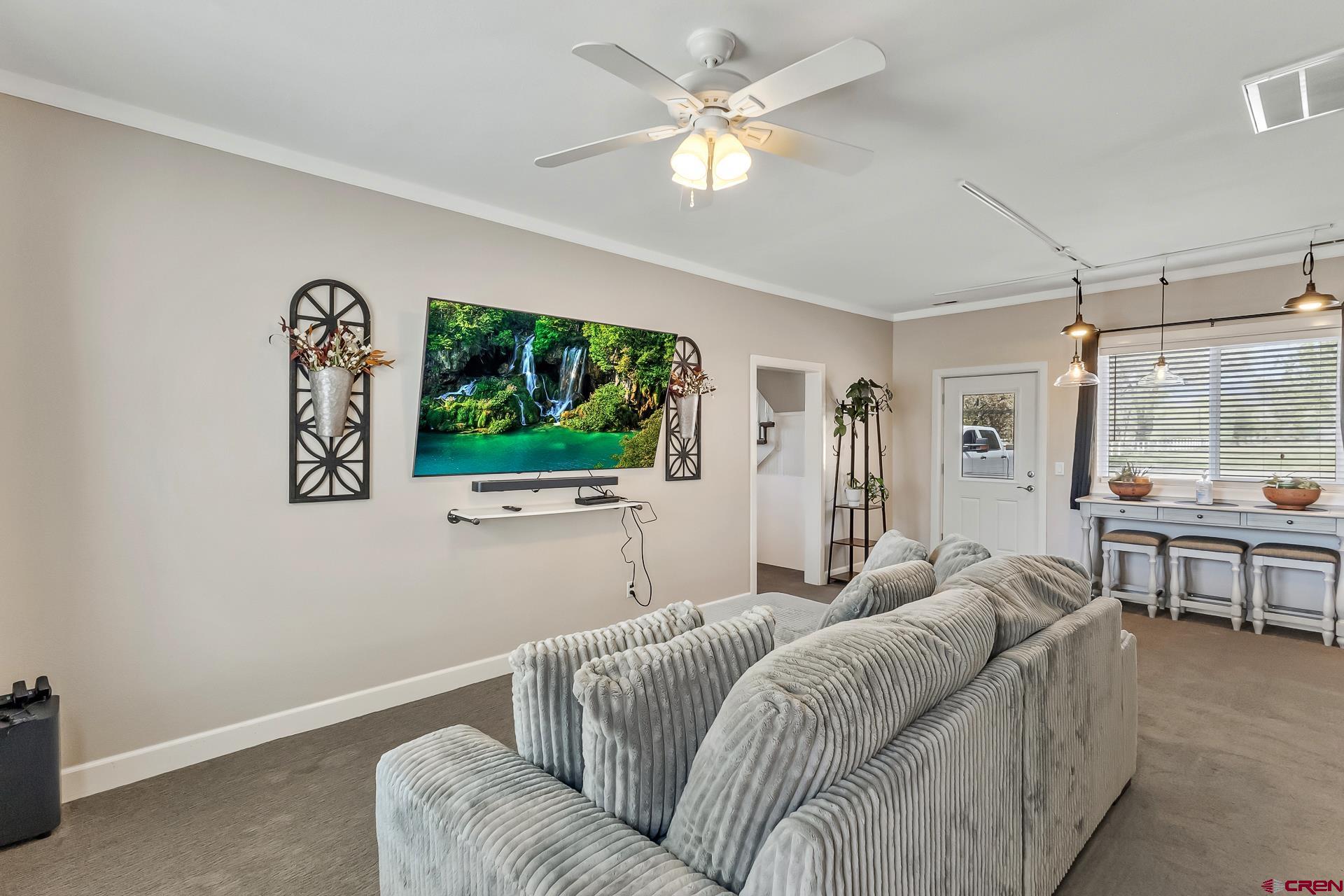 727 1550th Road Delta, CO 81416 - Photo 18 of 43 a living room with a couch