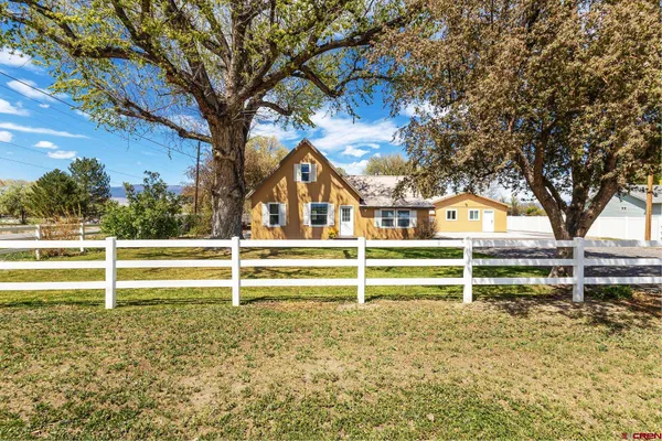 a kitchen with stainless steel appliances granite countertop a refrigerator stove microwave and sink