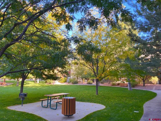 a view of swimming pool with a patio