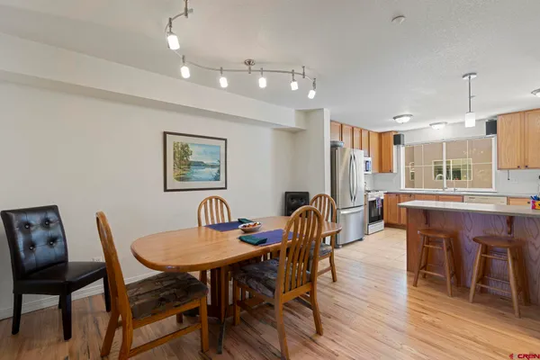 a view of a dining room with furniture