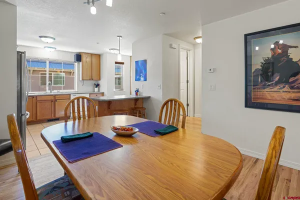 a view of a dining room with furniture