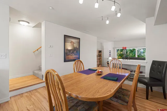 a kitchen with a sink cabinets and window