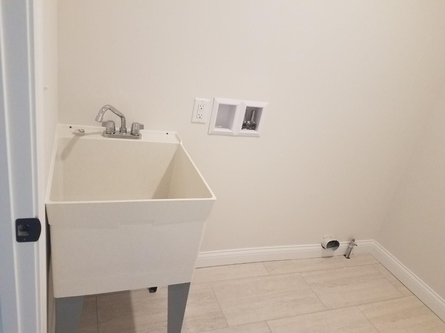 17524 Sunrise Drive Lowell, IN 46356 - Photo 4 of 4 a bathroom with a bathtub