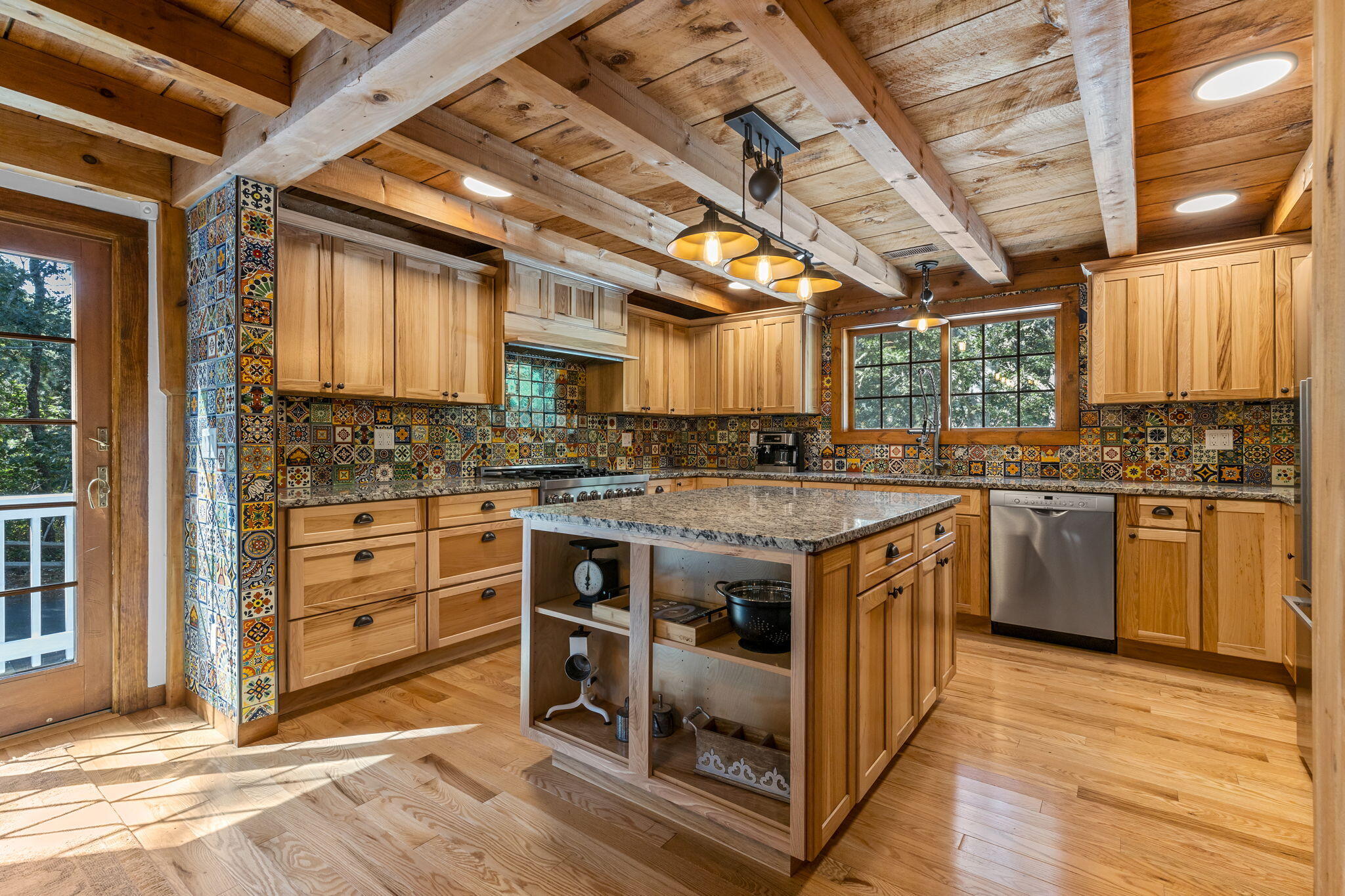 97 Round Cove Road Chatham, MA 02633 - Photo 21 of 55 a kitchen with a stove sink and cabinets