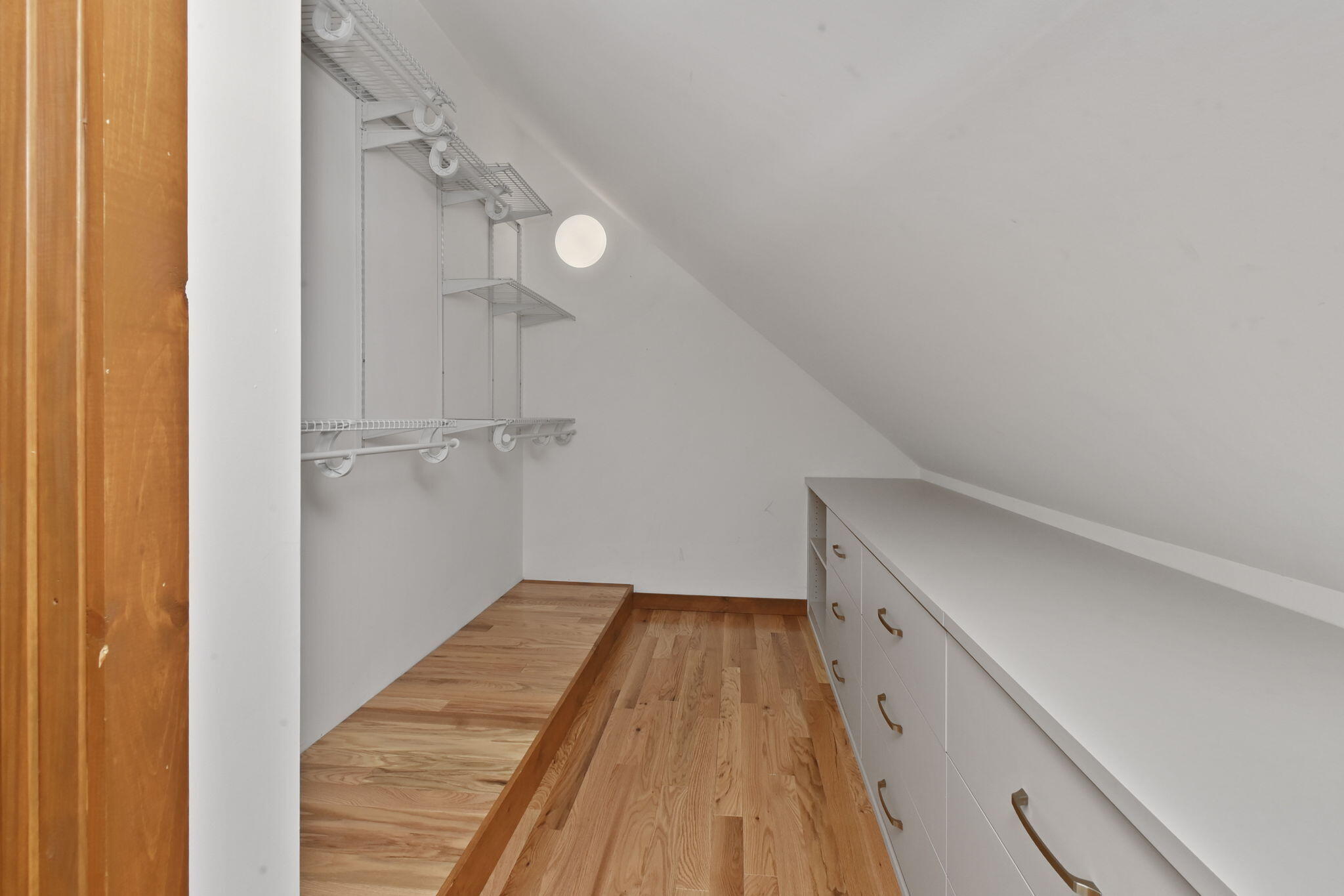 97 Round Cove Road Chatham, MA 02633 - Photo 25 of 55 a view of a hallway with wooden floor and staircase