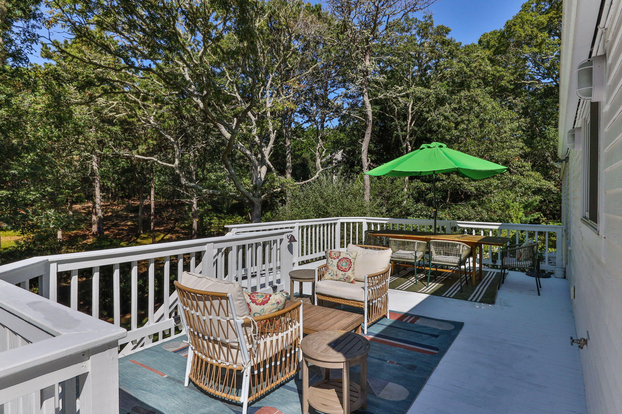 97 Round Cove Road Chatham, MA 02633 - Photo 39 of 55 a view of balcony with wooden floor and outdoor seating