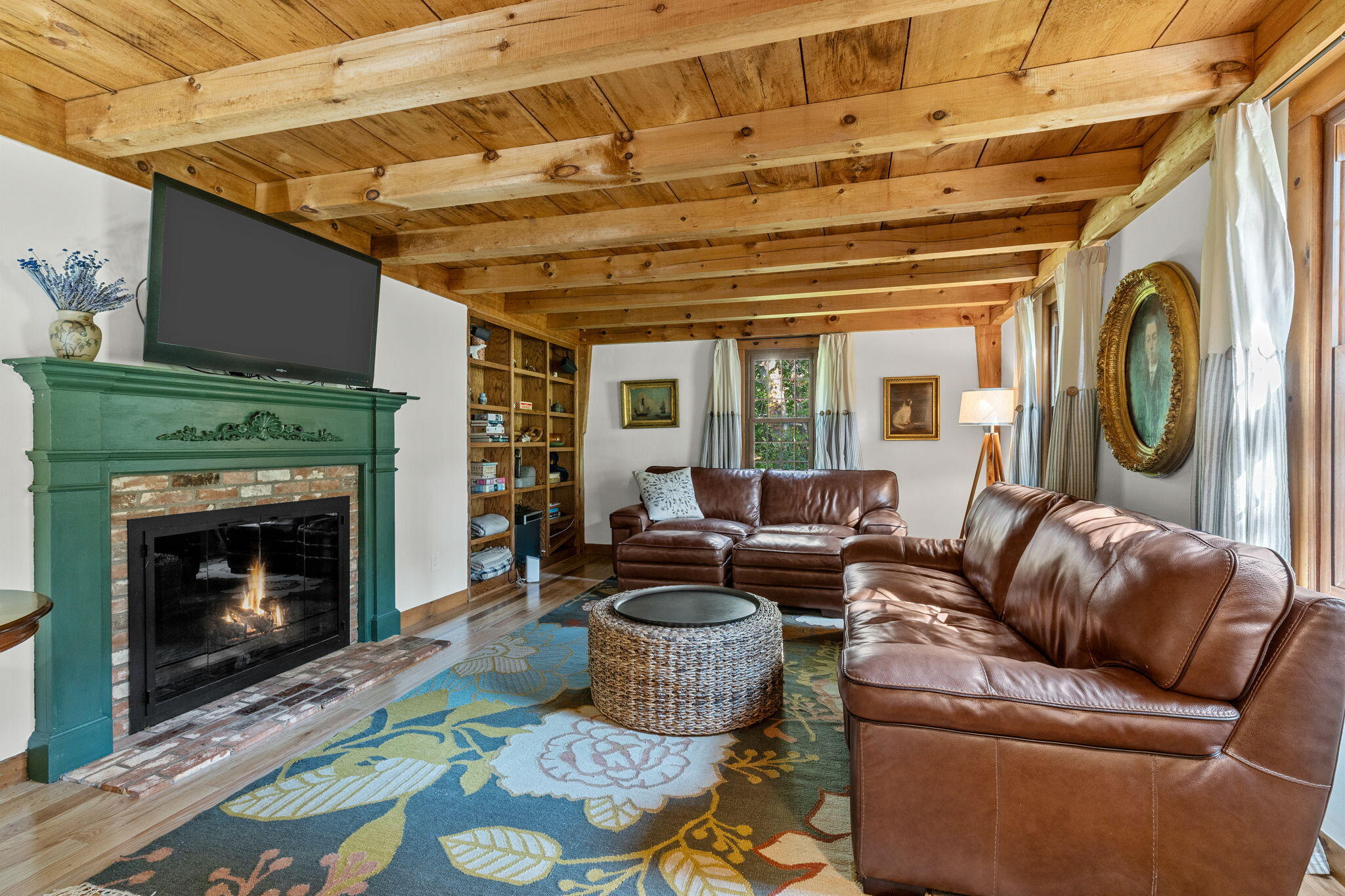 97 Round Cove Road Chatham, MA 02633 - Photo 4 of 55 a living room with furniture and a fireplace