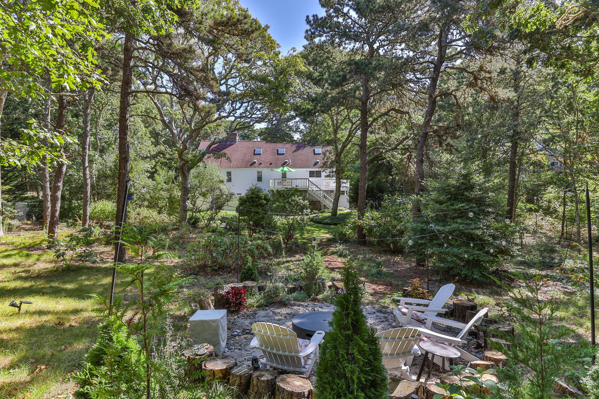 97 Round Cove Road Chatham, MA 02633 - Photo 46 of 55 an aerial view of a house with a yard
