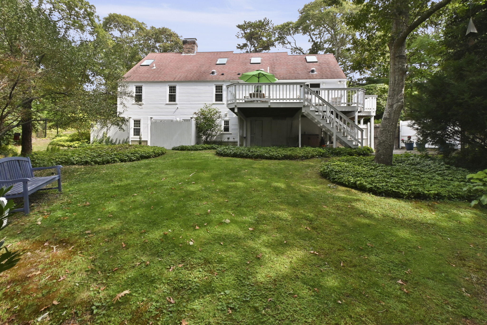 97 Round Cove Road Chatham, MA 02633 - Photo 50 of 55 a view of a house with a back yard