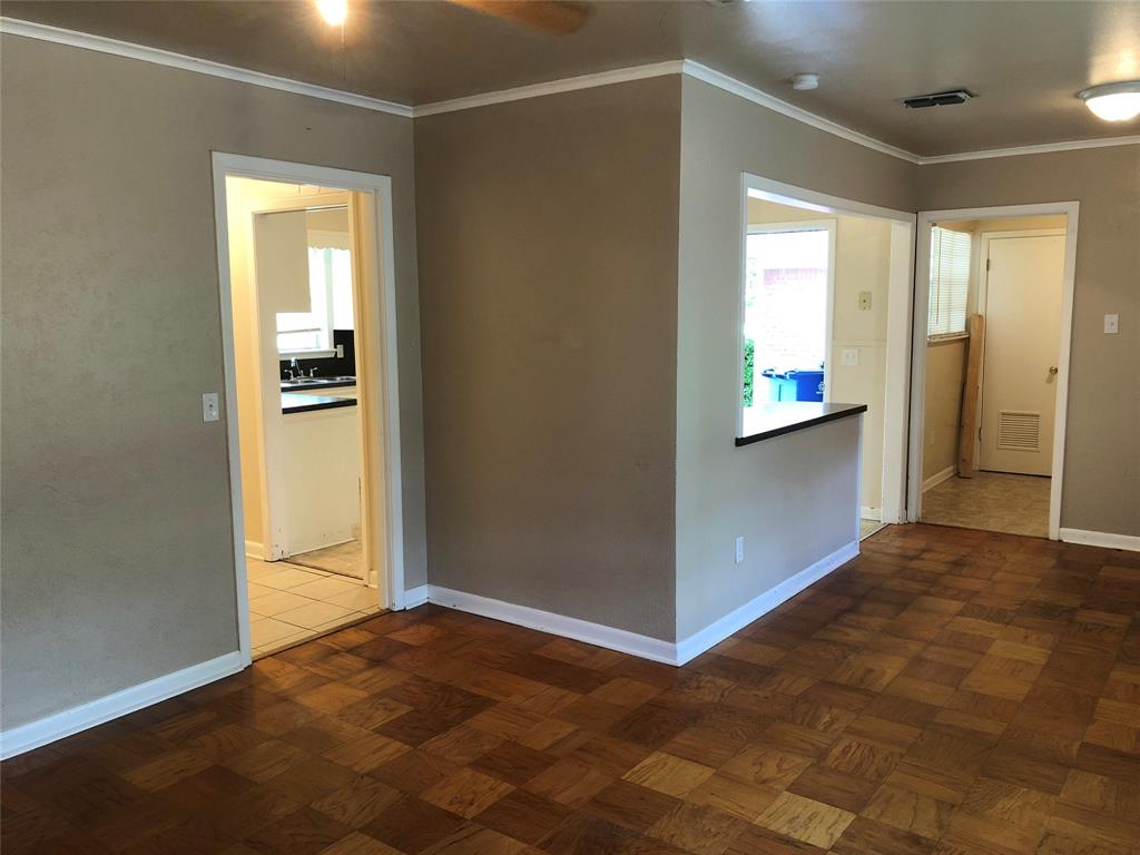 2722 Bolch Street Shreveport, LA 71104 - Photo 6 of 13 an empty room with windows and closet