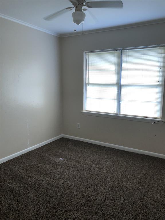 2722 Bolch Street Shreveport, LA 71104 - Photo 7 of 13 an empty room with a window