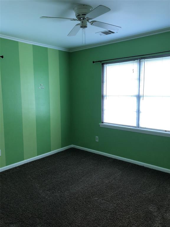 2722 Bolch Street Shreveport, LA 71104 - Photo 8 of 13 a view of room with window and a fan