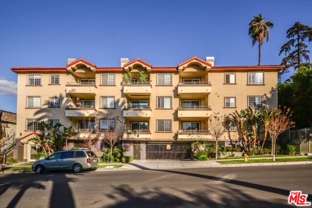 a front view of a building with street view