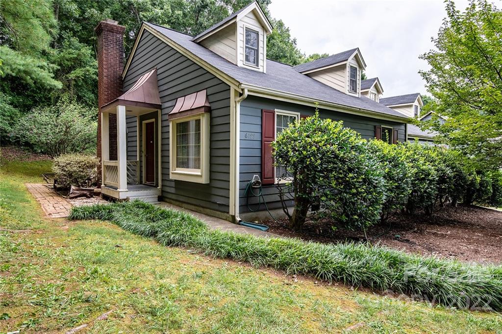 6199 Timberlane Terrace Hickory, NC 28601 - Photo 1 of 20 a front view of a house with garden