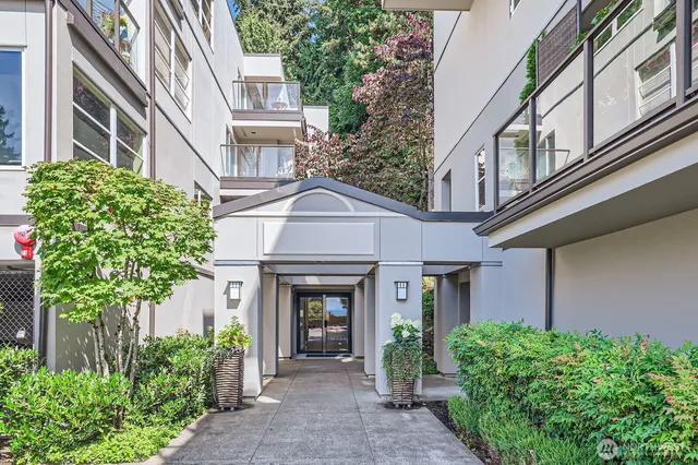 a view of a living room and kitchen