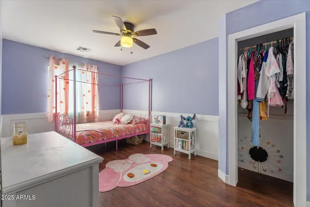 a bed room with a bed and a window