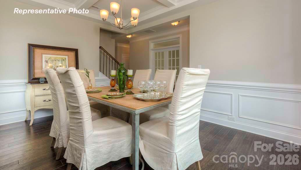 3003 Eclipse Court Indian Trail, NC 28079 - Photo 8 of 48 a view of a dining room with furniture and wooden floor
