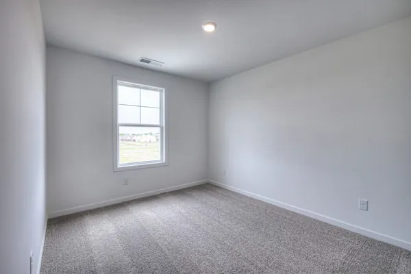 a view of empty room with window