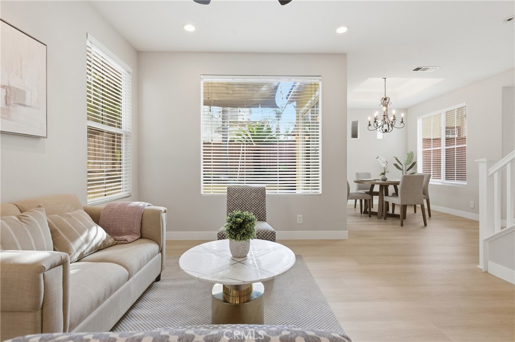 76 Kyle Court Ladera Ranch, CA 92694 - Photo 12 of 60 a living room with furniture and wooden floor