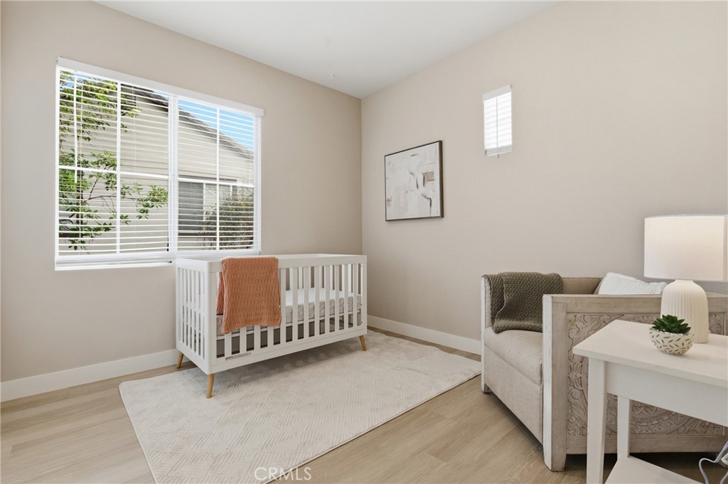 76 Kyle Court Ladera Ranch, CA 92694 - Photo 21 of 60 a bedroom with a bed and a window