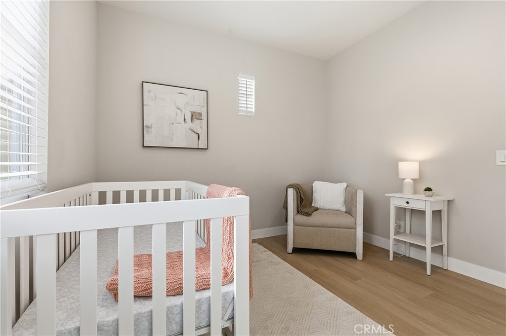 76 Kyle Court Ladera Ranch, CA 92694 - Photo 23 of 60 a bedroom with furniture and a window