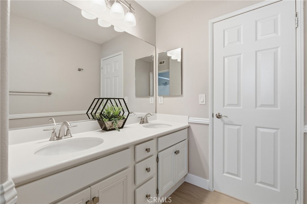 76 Kyle Court Ladera Ranch, CA 92694 - Photo 30 of 60 a bathroom with a sink and a mirror