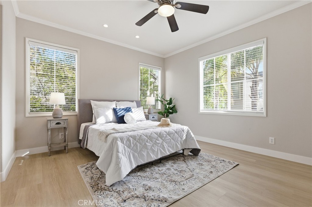 76 Kyle Court Ladera Ranch, CA 92694 - Photo 33 of 60 a spacious bedroom with a large bed and a window