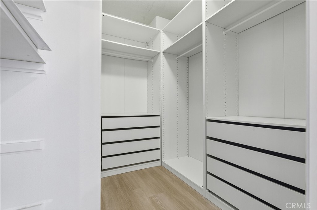 76 Kyle Court Ladera Ranch, CA 92694 - Photo 37 of 60 a view of walk in closet with empty racks