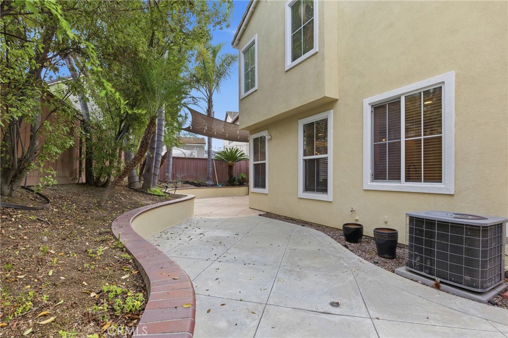 76 Kyle Court Ladera Ranch, CA 92694 - Photo 45 of 60 a front view of a house with a yard