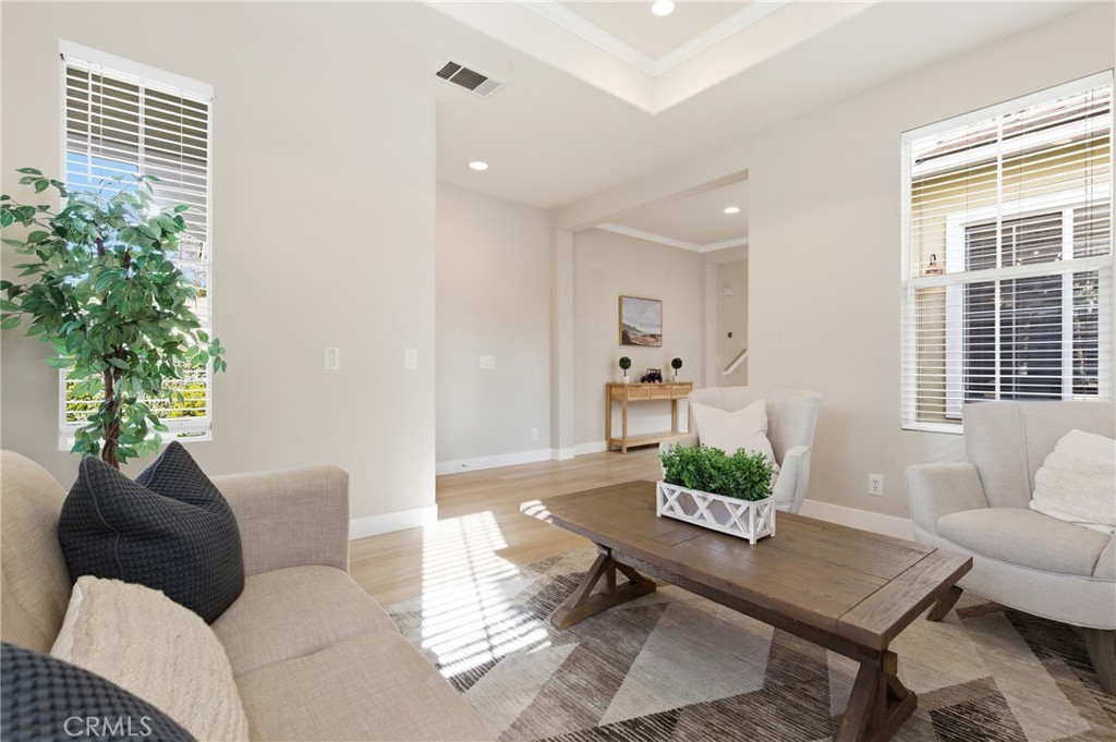 76 Kyle Court Ladera Ranch, CA 92694 - Photo 5 of 60 a living room with furniture and a potted plant
