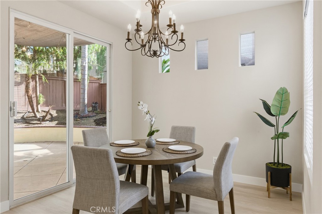 76 Kyle Court Ladera Ranch, CA 92694 - Photo 7 of 60 a view of a dining room with furniture window and outside view