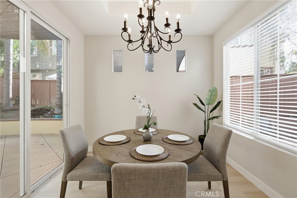 76 Kyle Court Ladera Ranch, CA 92694 - Photo 8 of 60 a view of a dining room with furniture window and outside view